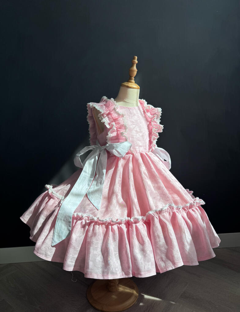Handmade pink girls formal dress with ruffles and ribbon ties